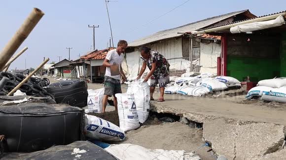 Sea level rise caused by climate change threatens Java, Indonesia - Buy ...