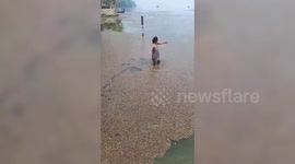 Volcanic rocks float in Philippines' lake sparking concern among residents