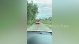 'Open-air' car with no roof and boot towed along road in Thailand