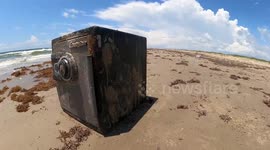 Ocean researchers find washed-up safe... with a surprise locked inside