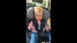 Sleeping child abruptly awakens from deep slumber upon hearing her favourite song