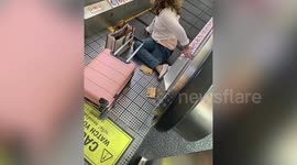 Travelators closed at Bangkok airport following woman's horror leg amputation as son slams bosses