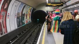 People arrive via the London Underground for Pride In London