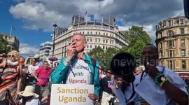 Peter Tatchell and other Pride in London marchers hold sit-down protest against draconian Ugandan anti-LGBT+ law