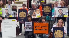 Family of jailed British activist join protest outside UK Foreign Office