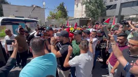 Palestinians carry the body of Mohammad Hasanin 21, who was shot and killed by Israeli soldiers during confrontations at the northern entrance to the city, in the West Bank city of Ramallah
