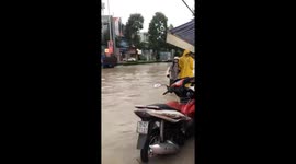 Heavy rain caused flooding throughout the city, making many vehicles unable to move
