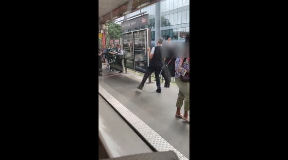 Unbelievable! Paris traffic ticket agents dance while users are fined. France, Issy-Val-De-Seine train station (SNCF society: Société Nationale des Chemins de Fer Français), Paris suburb. 4 july 2023.