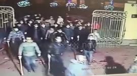 Hundreds of masked people smash a factory on Chinese New Year's Eve