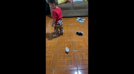 Boy Takes Out Chicken Toy