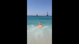 Mediterranean Sea Surfing Ends In A Splash