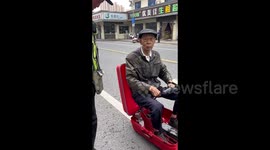 Innovative retiree transforms suitcase into mobility vehicle