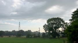 Thunderstorm in Leeds, West Yorkshire, with large balls of rain falling.