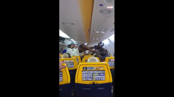 Chaos as passengers attempt to break up fight on Ryanair flight to London