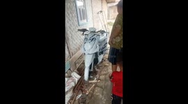 Kids turn idle paint into whimsical art on mom's motorbike!