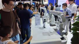 Visitors Visit Various Robots at 2023 WAIC in Shanghai, China