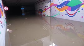 Monsoon in Delhi leaves six dead and leads to caved-in roads and flooded underpasses