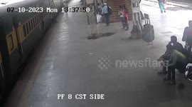 Vigilant cop comes to the aid of passenger who slipped while standing near train gate in western India