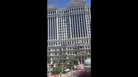 Please get rid of any audio in the video We were in the Octavius tower and across the pool we saw the window burst and all the security and cops moving everyone away from the pool because the window shattered as the guy started to continuously throw hot