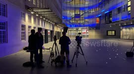 Reporters outside BBC headquarters in central  London as news breaks of presenter Huw Edwards