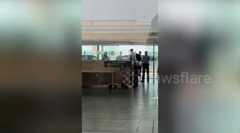 Harry Styles spotted landing in Barcelona with entourage in tow