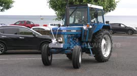 Bride arrives at wedding - on tractor