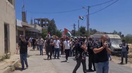 Palestinians clash with Israeli forces during a protest against Israeli settlements in the village of Umm Safa, near the West Bank city of Ramallah