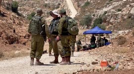 Palestinians take part in a protest following Friday prayer against settlement in the town of Deir Istiya, in the West Bank city of Salfit