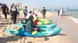 Palestinian players take part in the sailing and rowing championship on the shore of the Mediterranean, in Gaza city