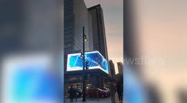 3D animation of cats, robots, and cars appear on giant LED screen in the Philippines