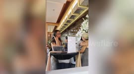 Guests use unique voicemail-sending booth to record heartfelt message to wedding couple