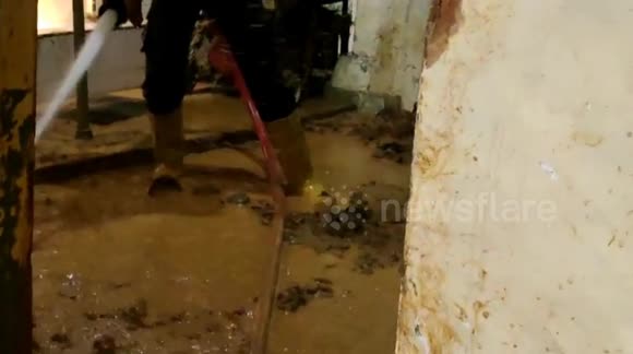 Indonesian fire team battles nature's mess after deadly landslides including cleaning mosque