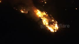 Wildfire burns out of control in Switzerland as heatwave continues to scorch Europe