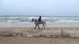 Women tourists take to horse riding on Salalah Beach of Dhofar region of Oman.during the moonsoon season and peak holiday time for the region