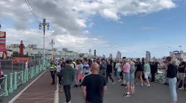 Hundreds gather to watch the Royal albian hotel in Brighton be demolished