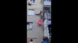 Drunk man survives 5th-floor fall after his catches antenna, stopping his descent
