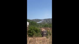 Car on fire, big smoke clouds on highway in Algarve, fire spreading