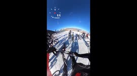 Professional Bicyclists Race Down Alps