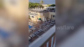 Brits abroad flood to claim sunbeds after queuing since 7am for the pool to open