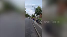 Man disarms knife-wielding thug as they wrestle in the middle of 'Britain's roughest street'