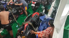 Super Typhoon Doksuri shakes ferry knocking over motorcycles in the Philippines