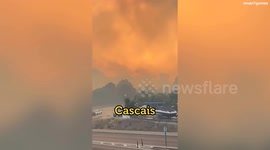 Red skies as wildfires surround the Portuguese suburb of Cascais