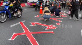 Protests continue in Bangkok amid anger over 'sham election' with winner threatened with jail