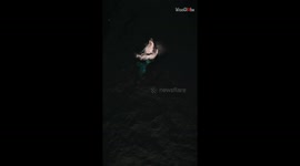 STUN-tacular bird's eye view of a colossal Humpback Whale breaching