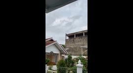 Adventurous Manda: a curious cat's high-rise escapades in Yogyakarta!