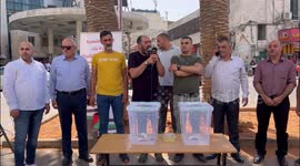 Palestinians participate in a campaign to provide homes for the families of Palestinians it accuses of attacking Israelis that were demolished by the Israeli forces