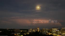 Spectacular Lightning Bolts, Full Moon, & Vibrant, Colorful sky over Washington, DC area