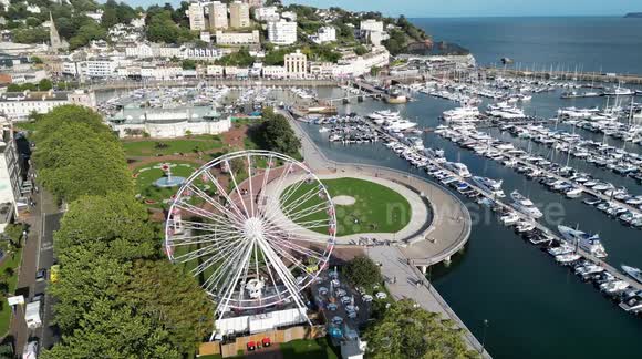Ferris wheel at Torquay Harbour the English Riviera on a sunny evening in July 2023