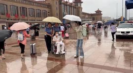 Beijing on high alert as heavy rain continues
