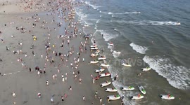 Tourists Play At A Beach Amid Heatwave In Beihai, Guangxi, China